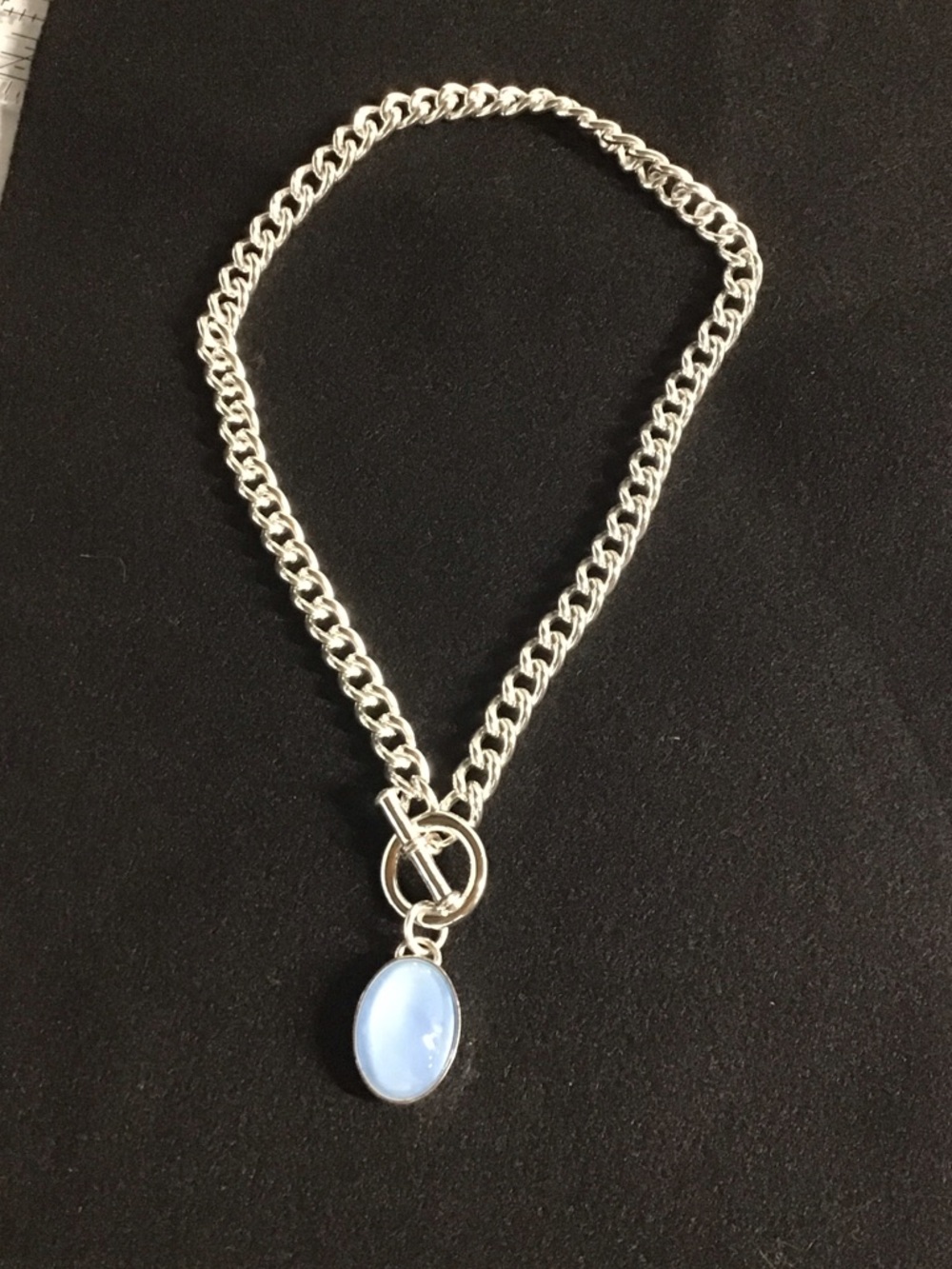 Silver Chain Necklace with Light Blue Oval Pendant. 19 inch chain
